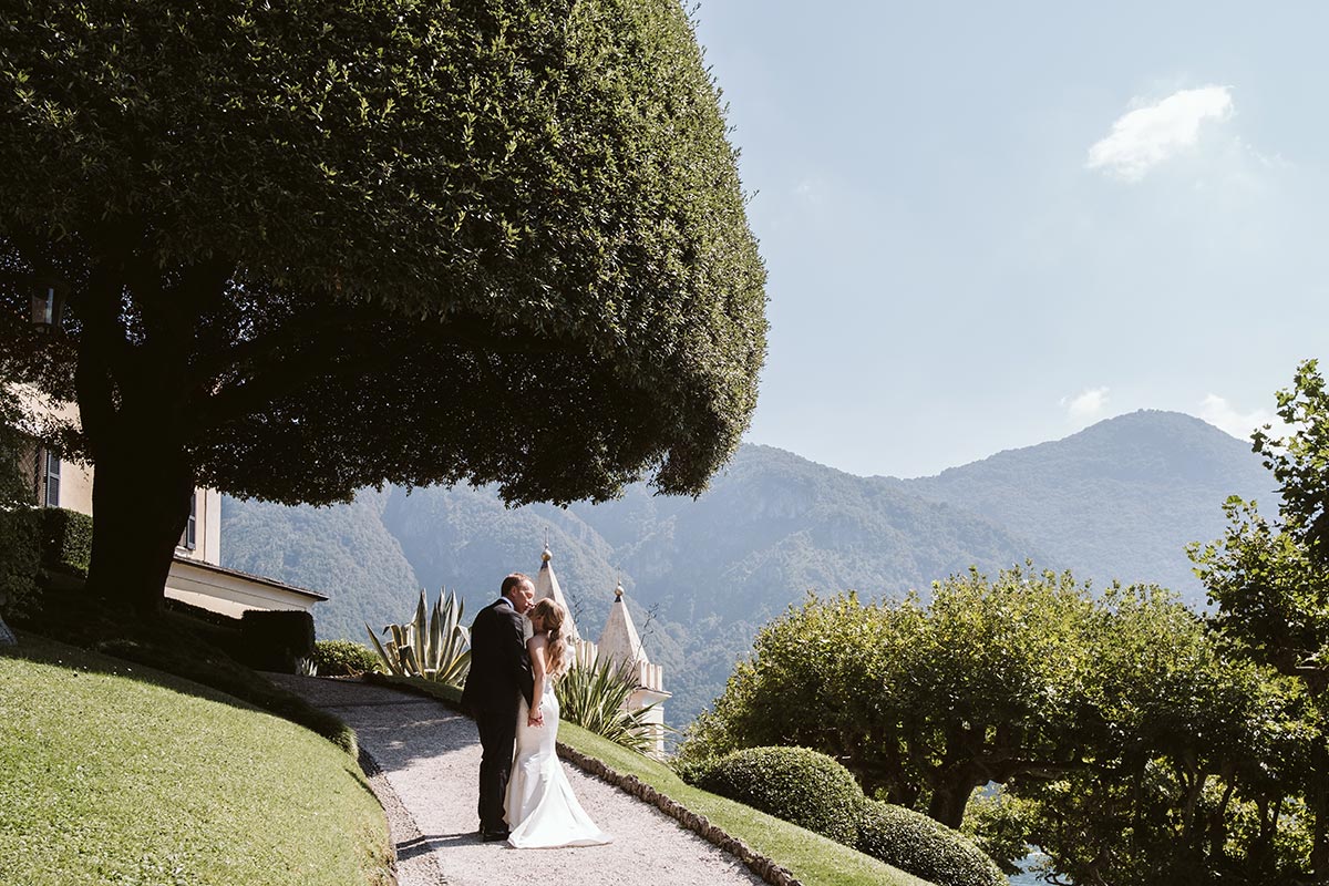 A bride and groom embrace after their wedding elopement at Villa Balbianello, Lake Como, Italy